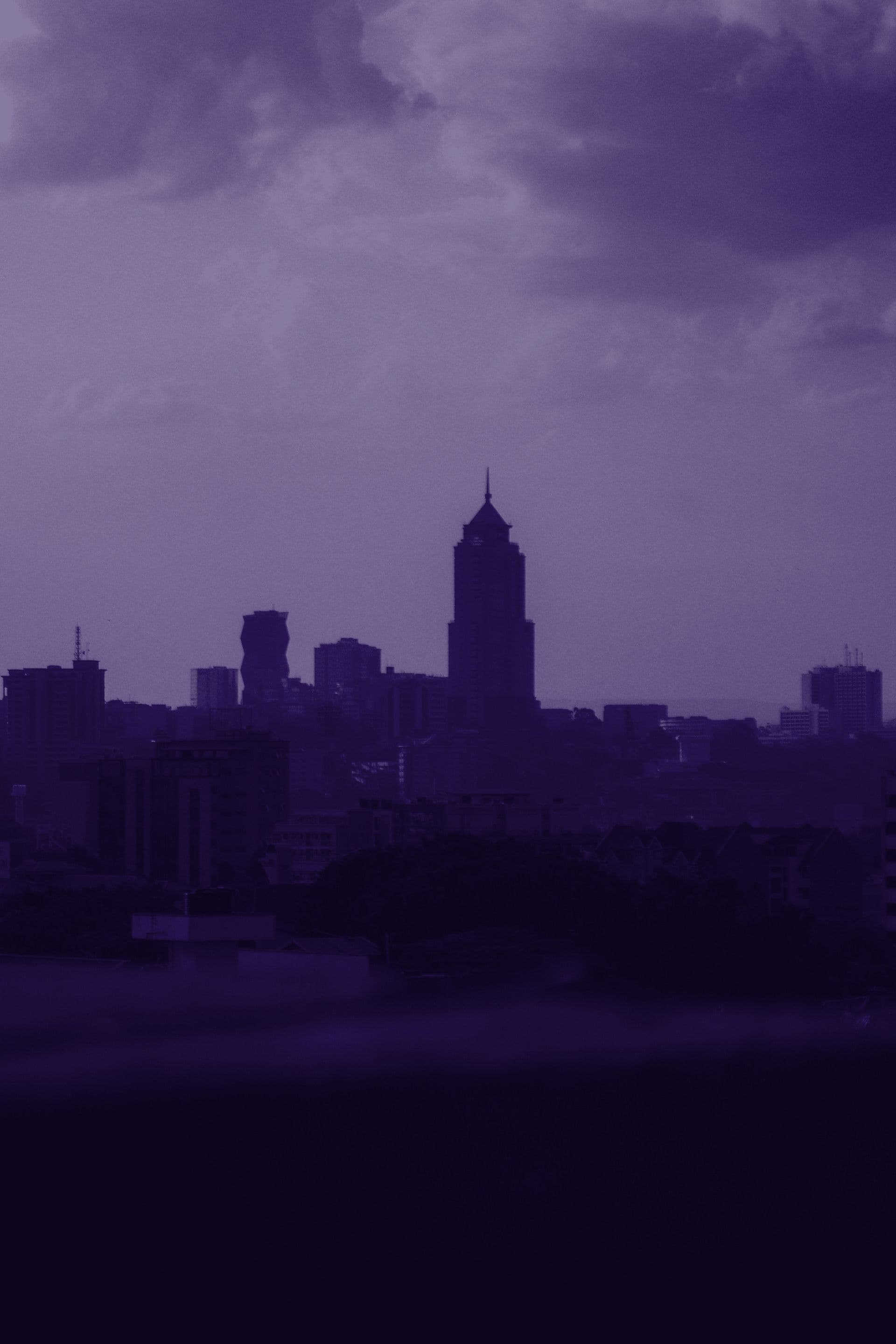 Aerial view of Nairobi's central business district skyline at dusk