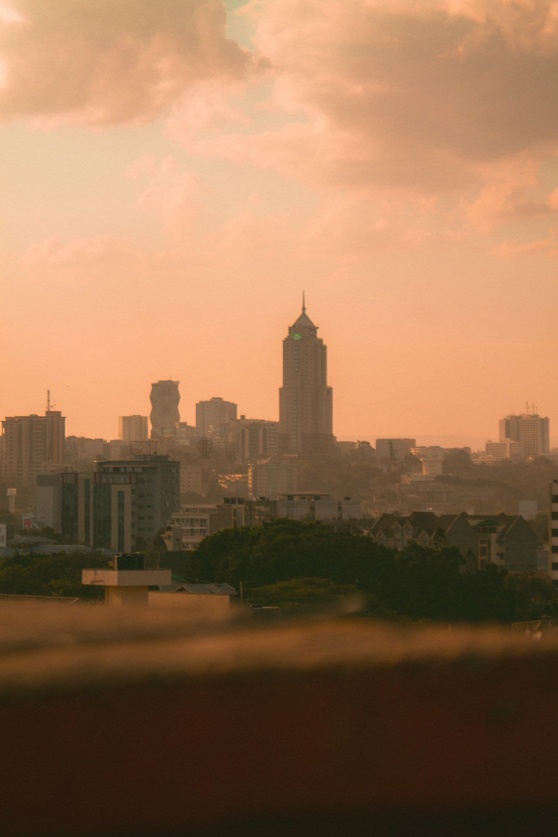 Aerial view of Nairobi's central business district skyline at dusk