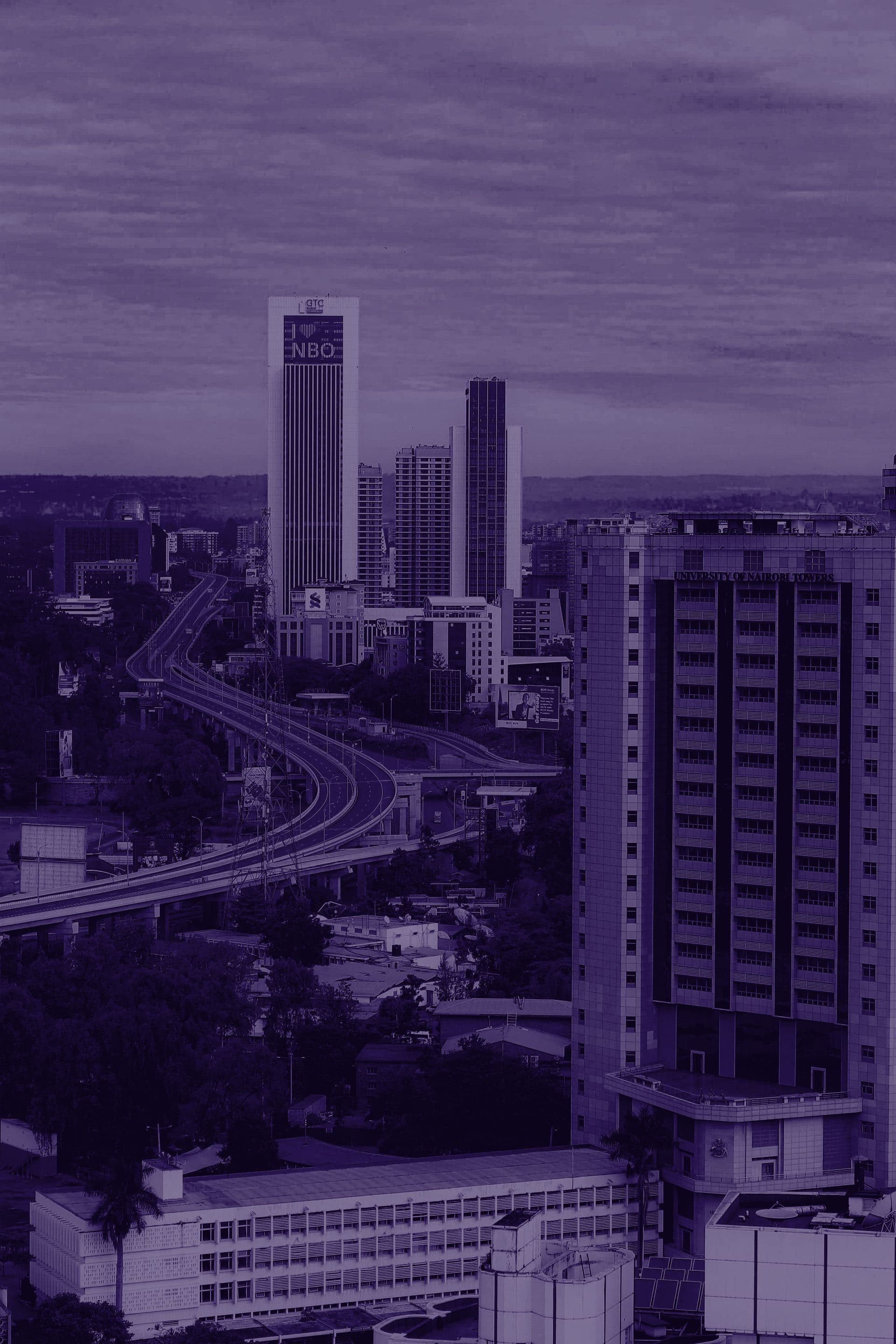 Aerial view of the Nairobi Expressway winding past University of Nairobi Towers